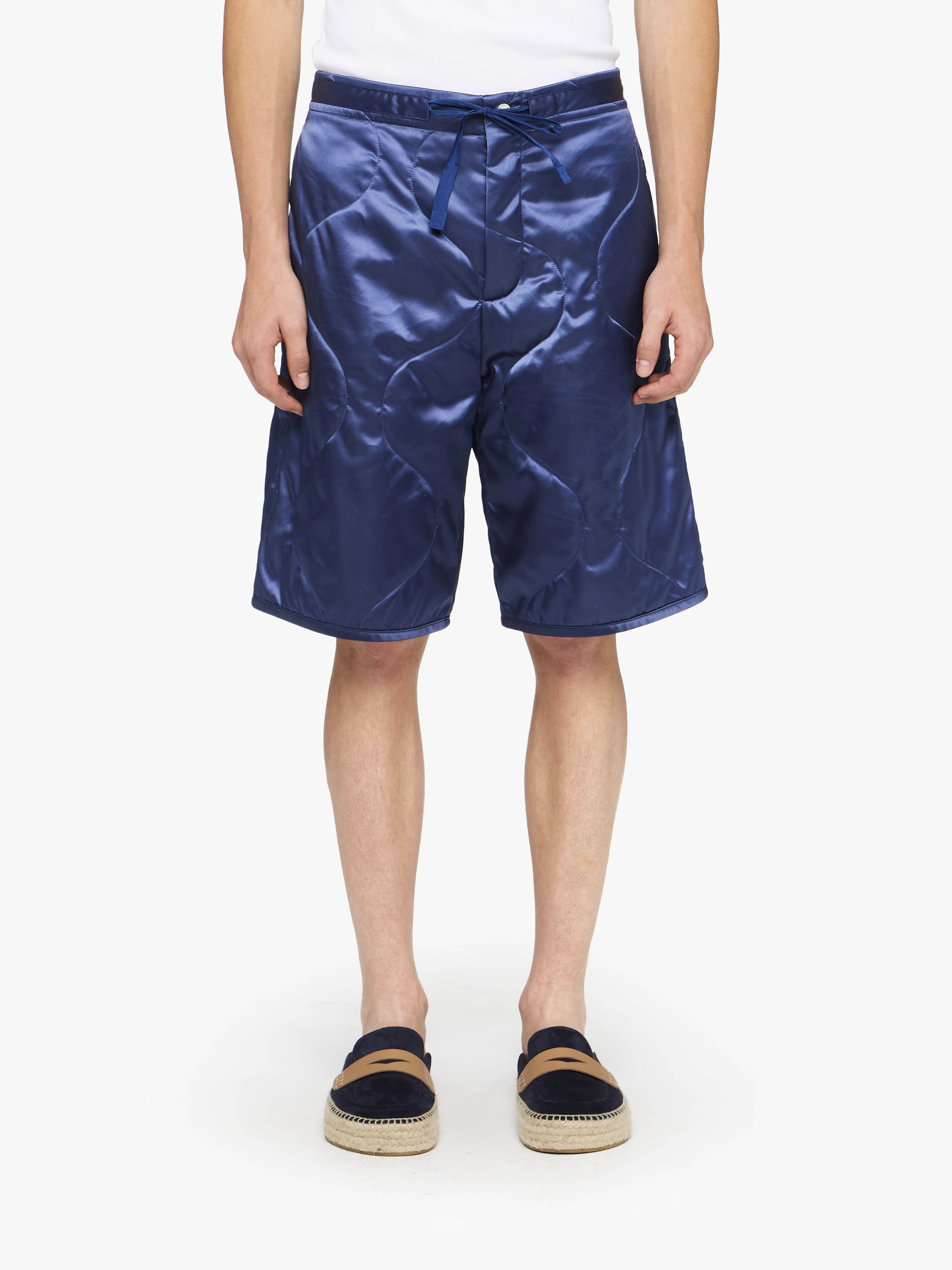 SHORTS TRAPUNTATI