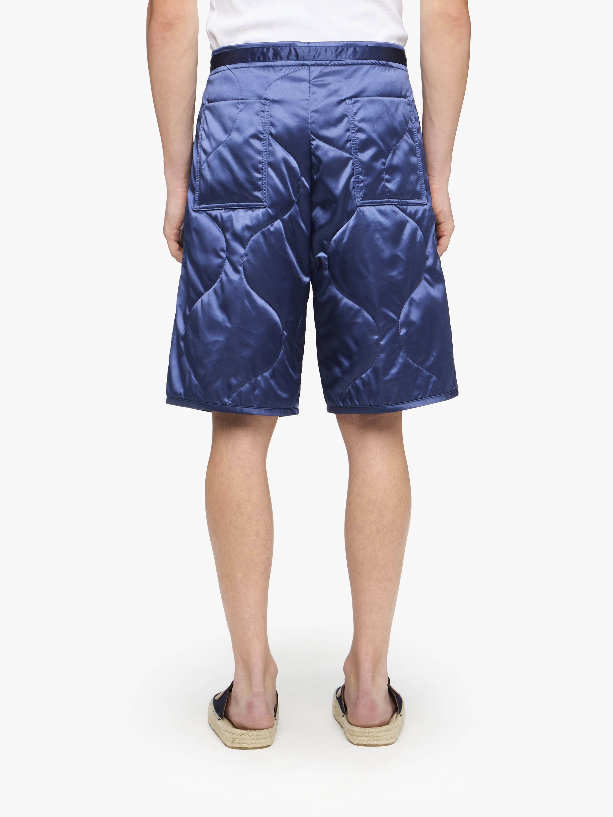 SHORTS TRAPUNTATI
