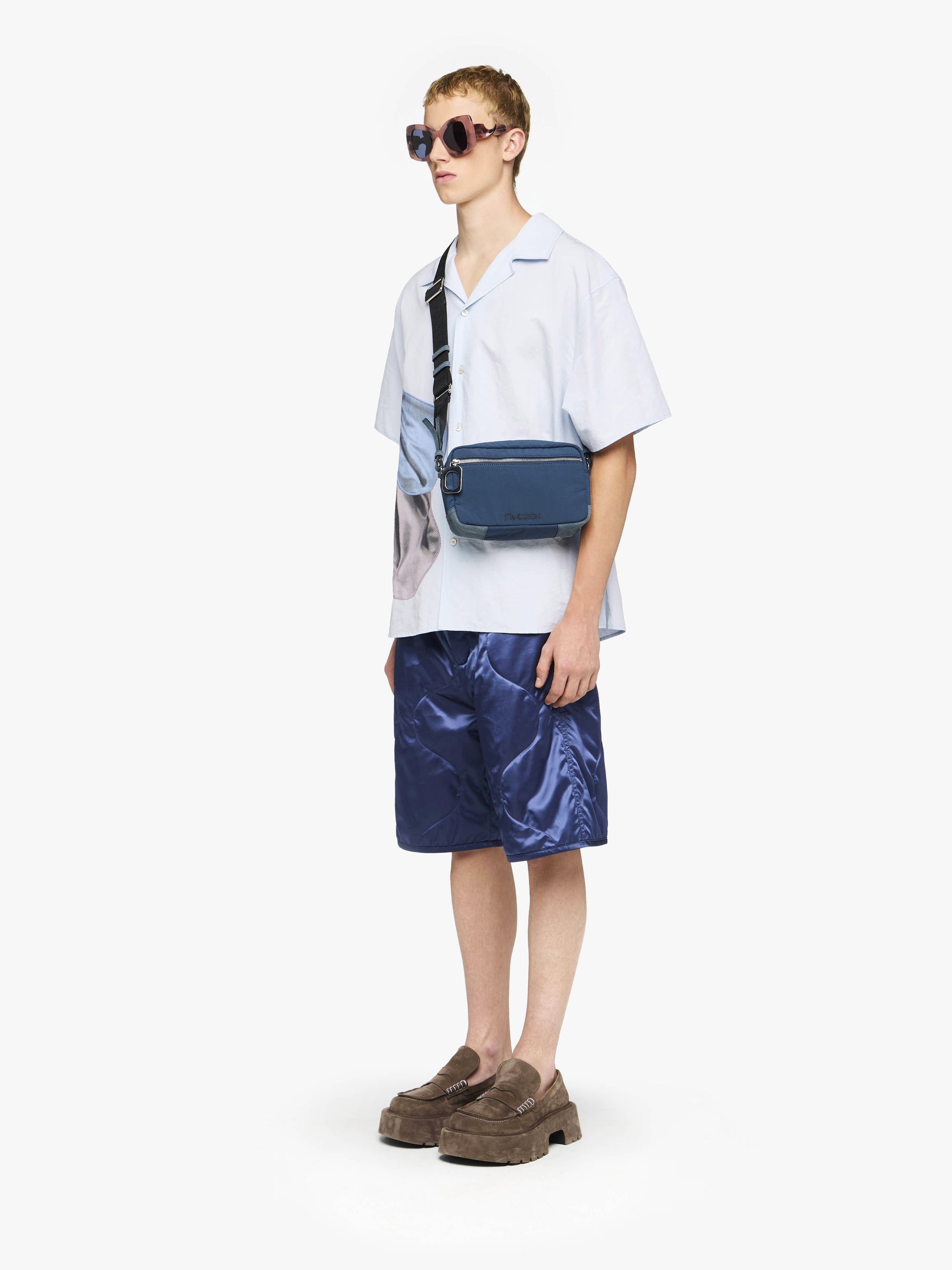 SHORTS TRAPUNTATI