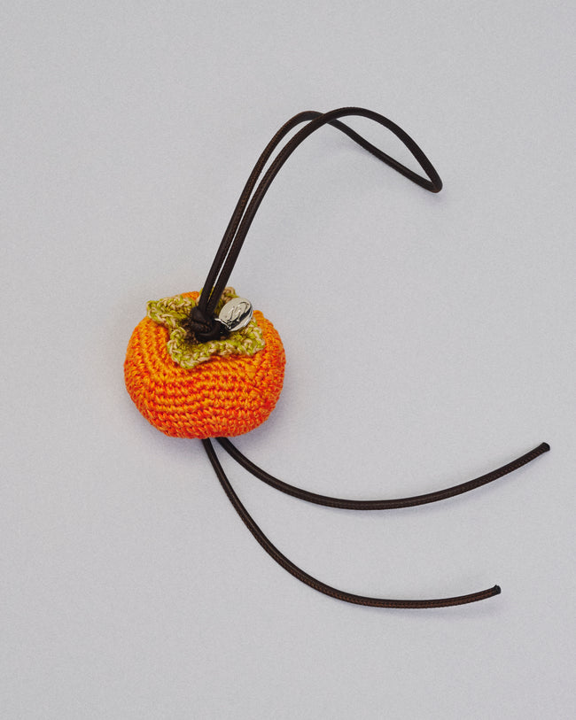 HAND-CROCHETED PERSIMMON CHARM