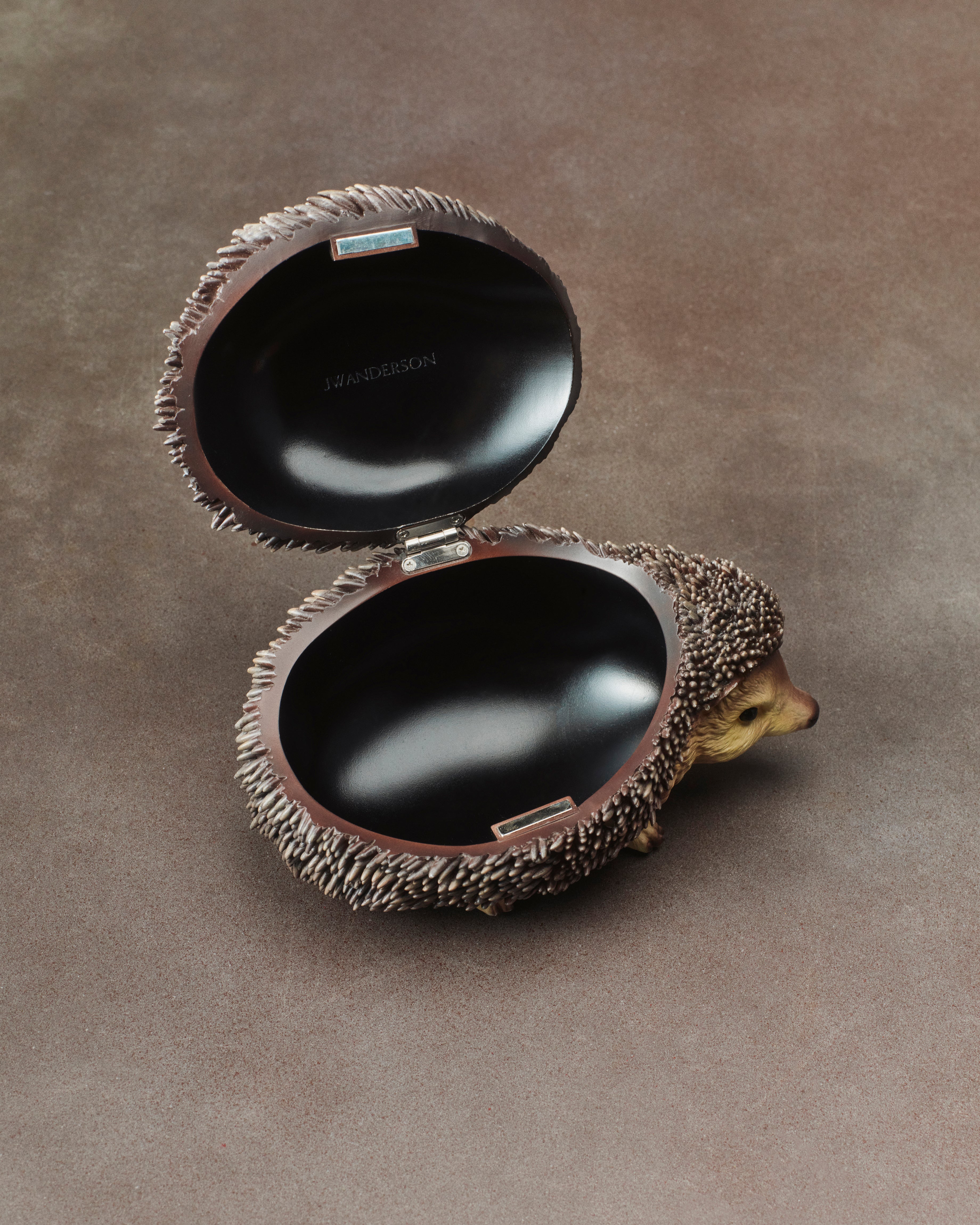 HEDGEHOG CLUTCH IN BROWN in BROWN AC0442FA0178600O/S | JW Anderson SG