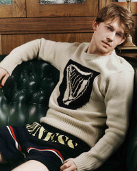 Unisex JW ANDERSON X GUINNESS SHIELD HARP JUMPER IN IVORY