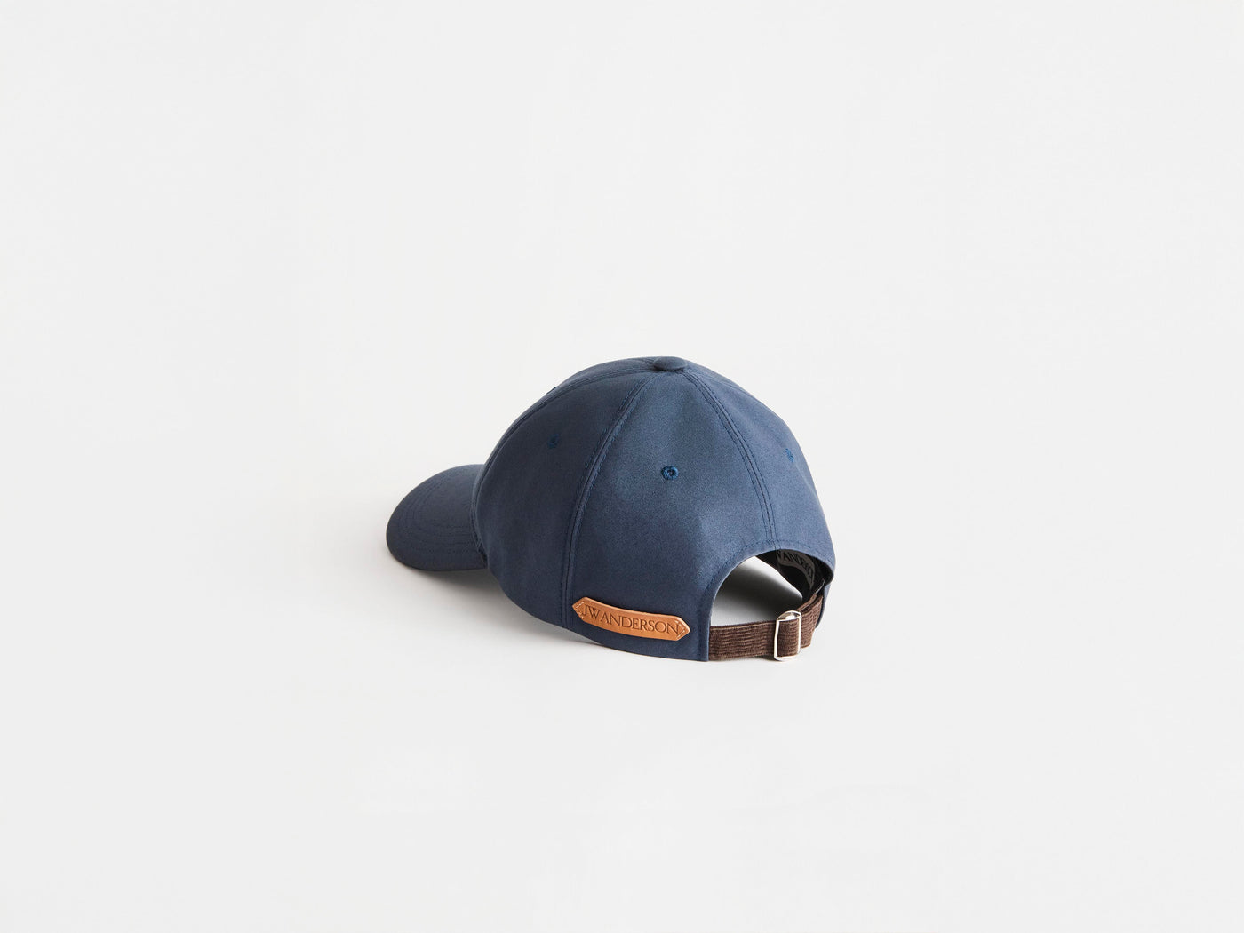 WAXED COTTON BASEBALL CAP IN DARK BLUE