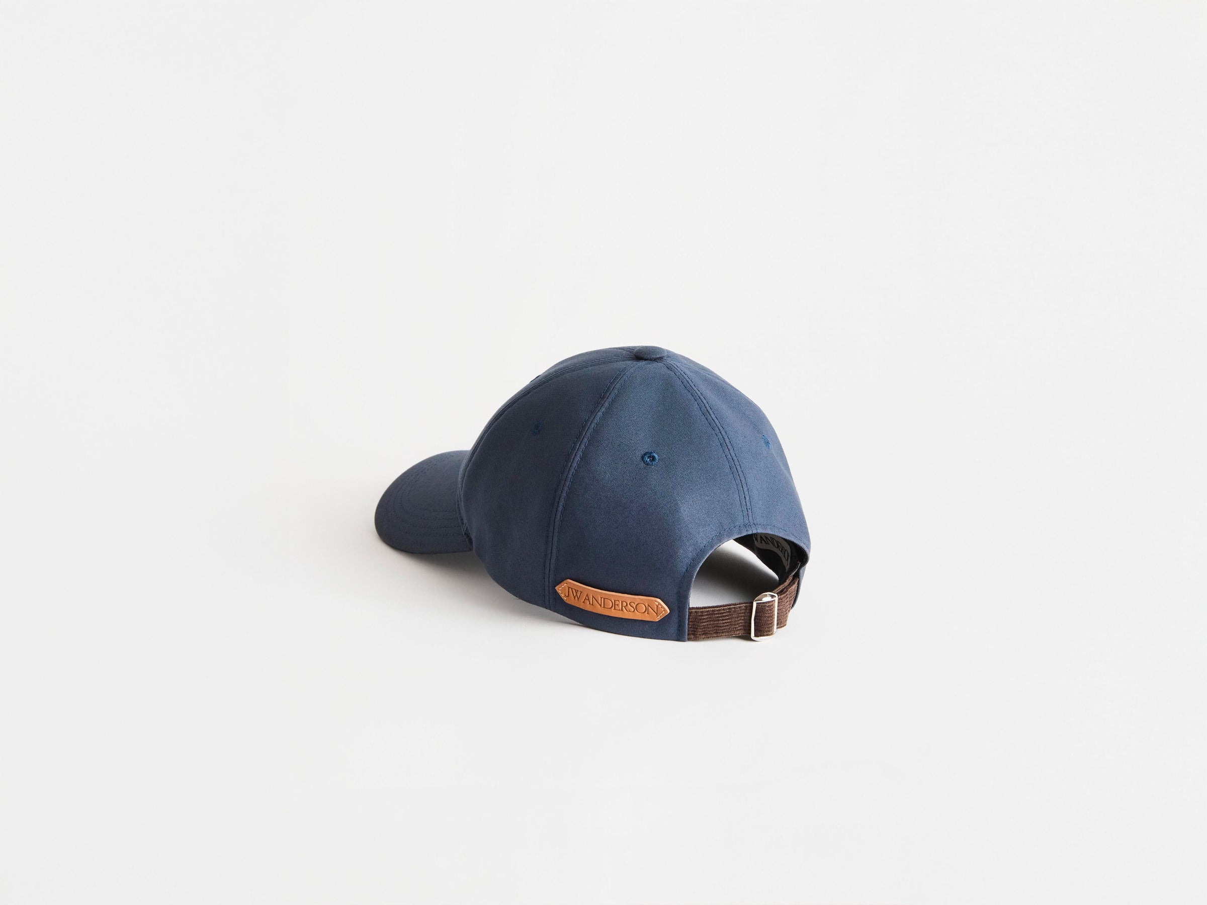 WAXED COTTON BASEBALL CAP IN DARK BLUE