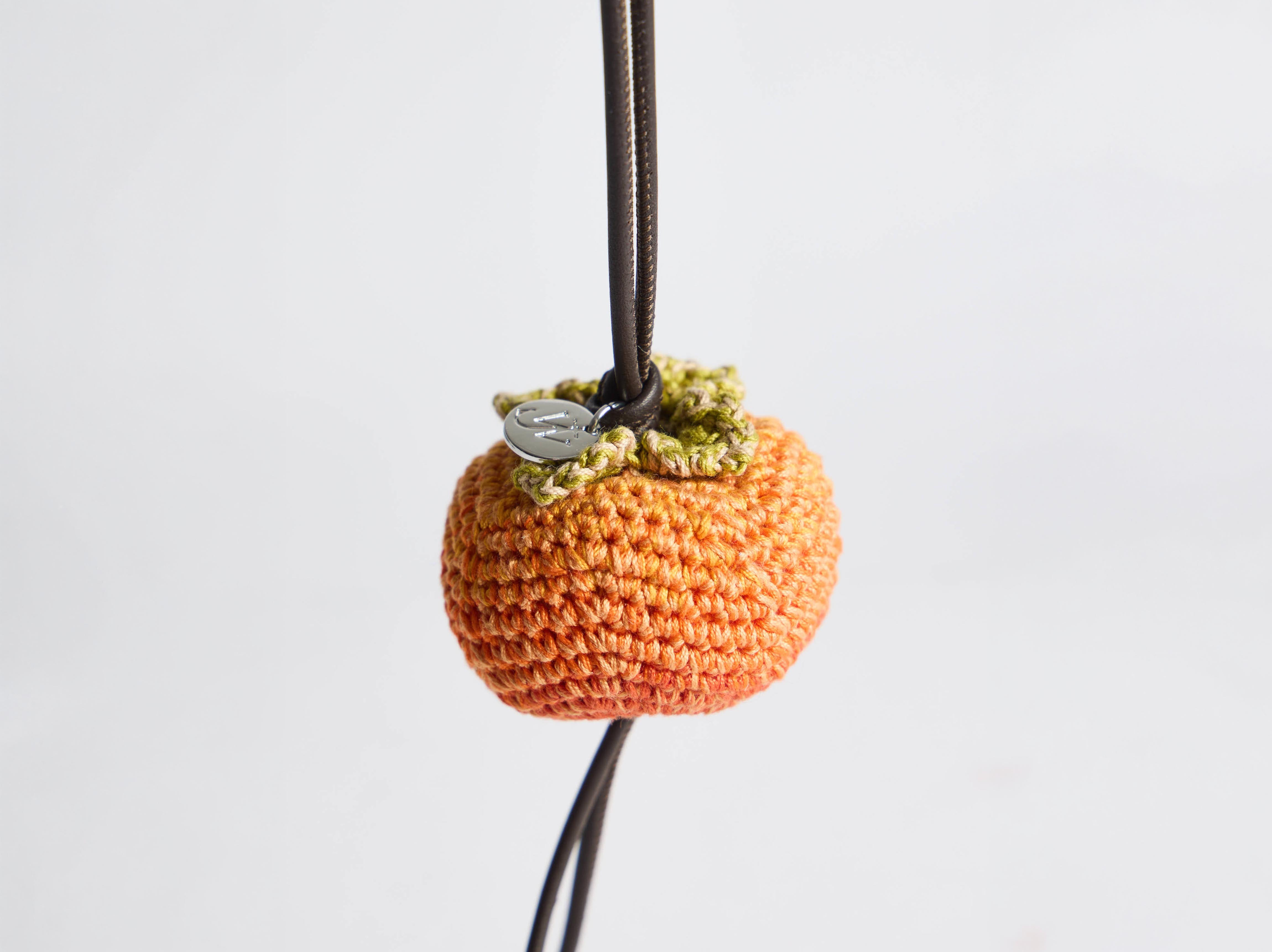 HAND-CROCHETED PERSIMMON CHARM in ORANGE/GREEN AC0454FA0531703O/S