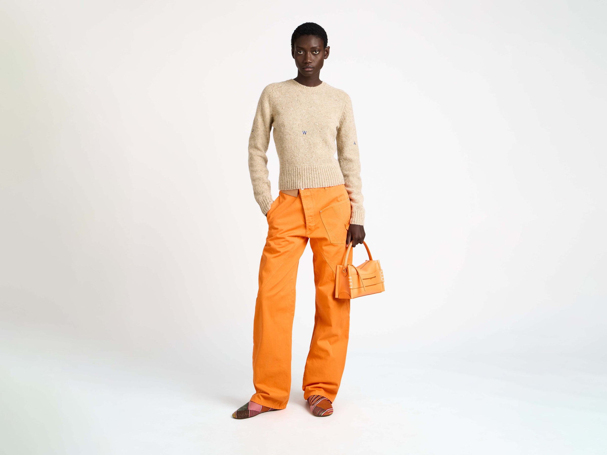 small loafer bag bright orange Model Front 3