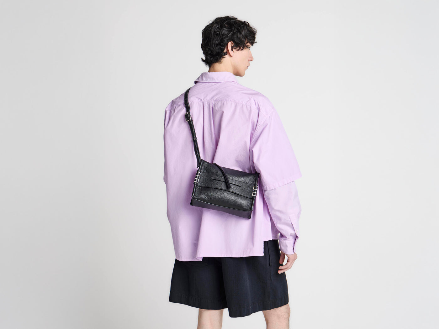 SMALL MESSENGER LOAFER BAG IN BLACK LEATHER