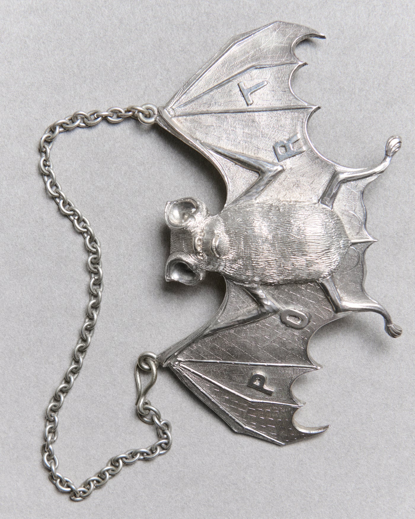 19TH CENTURY SILVER BAT WINE LABEL IN SILVER