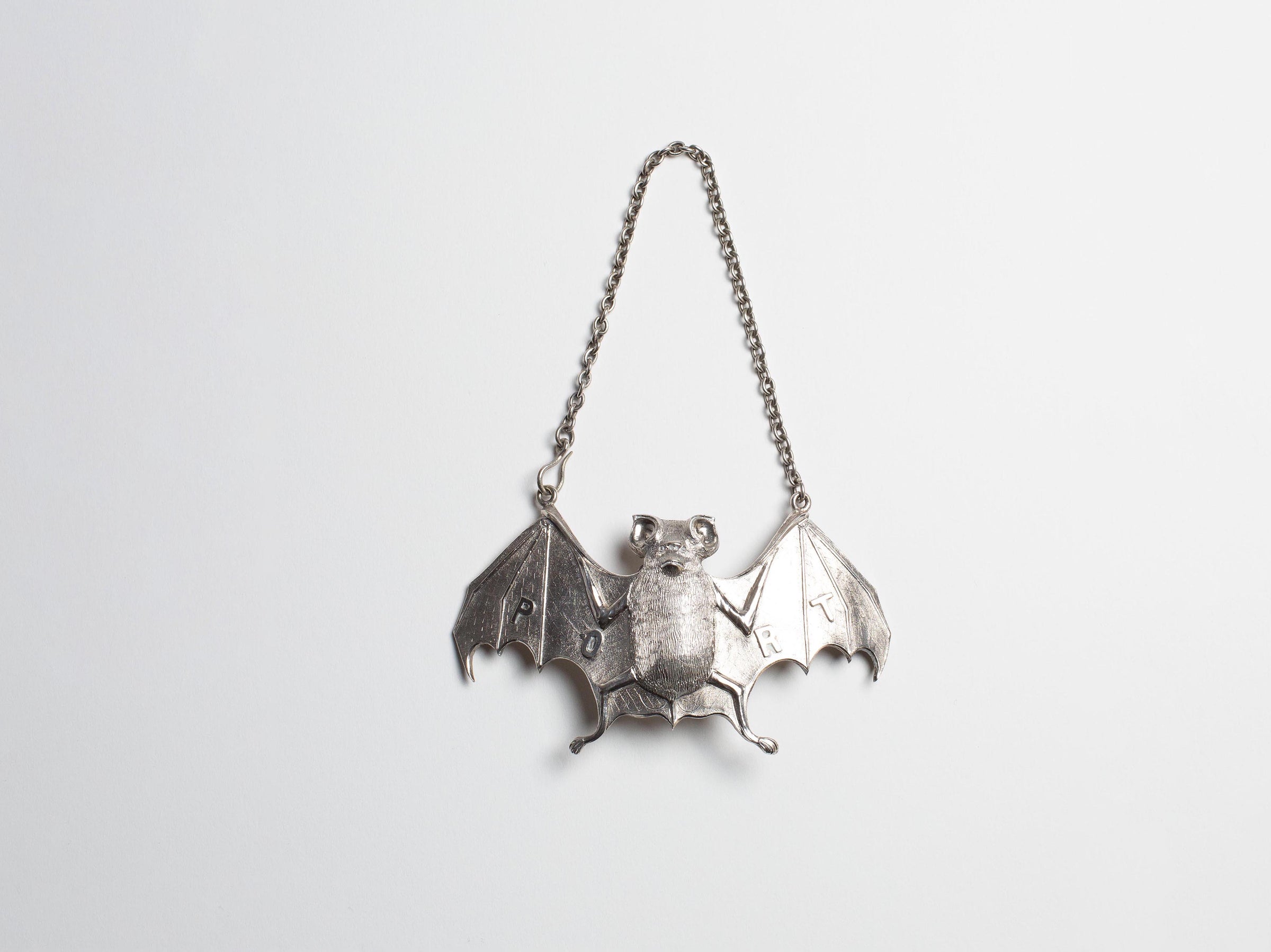 19TH CENTURY SILVER BAT WINE LABEL IN SILVER