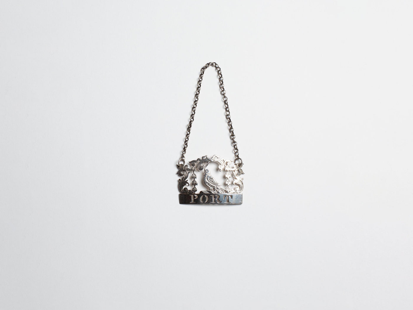 WILLIAM IV SILVER ARMORIAL WINE LABEL IN SILVER