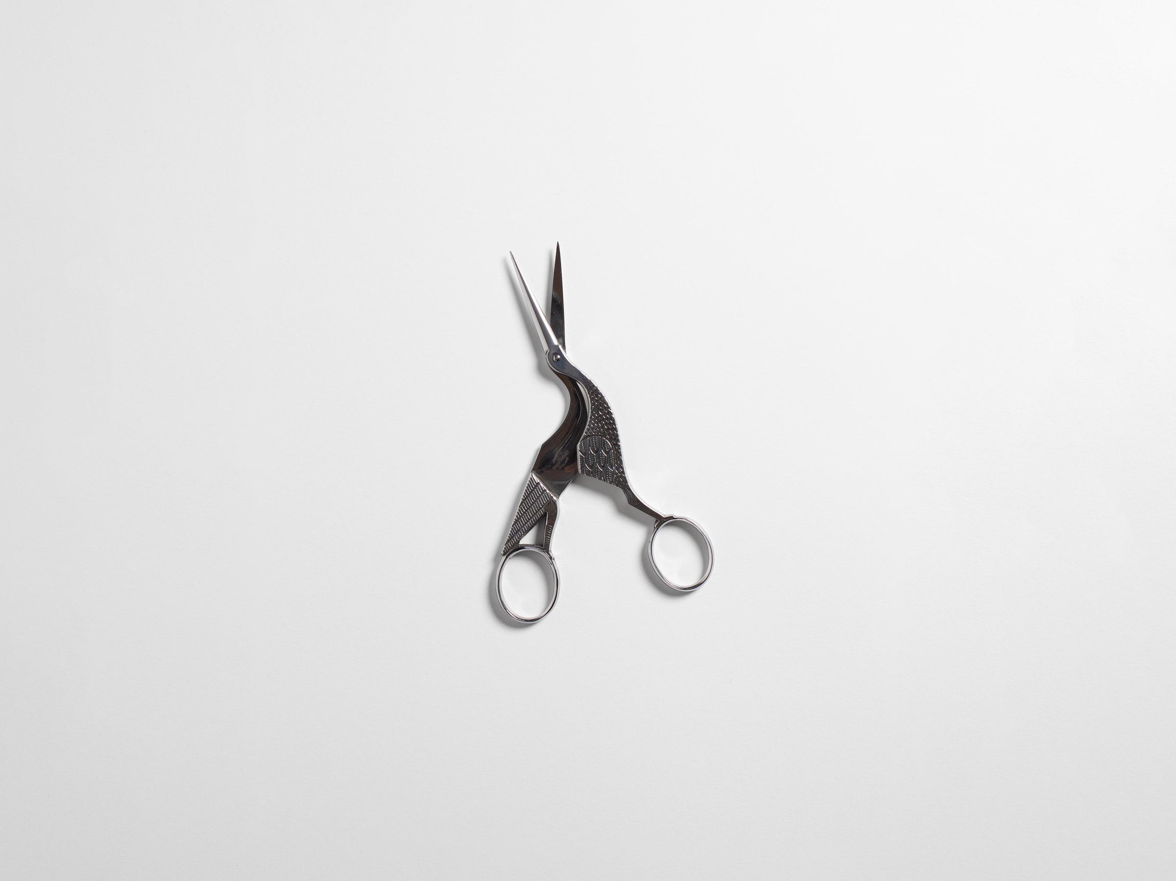 ANTIQUE SCISSORS IN SILVER