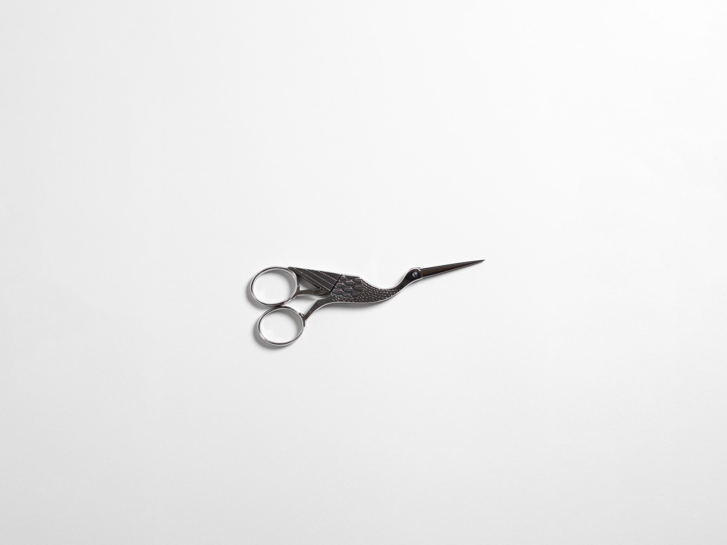 ANTIQUE SCISSORS IN SILVER