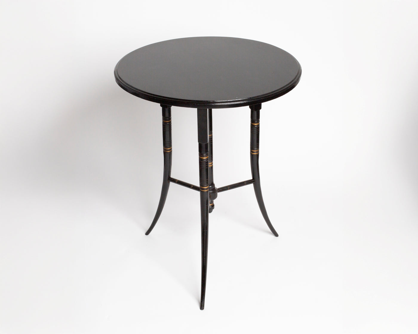 ANTIQUE ROUND SIDE TABLE IN BLACK BY E W GODWIN [1870]
