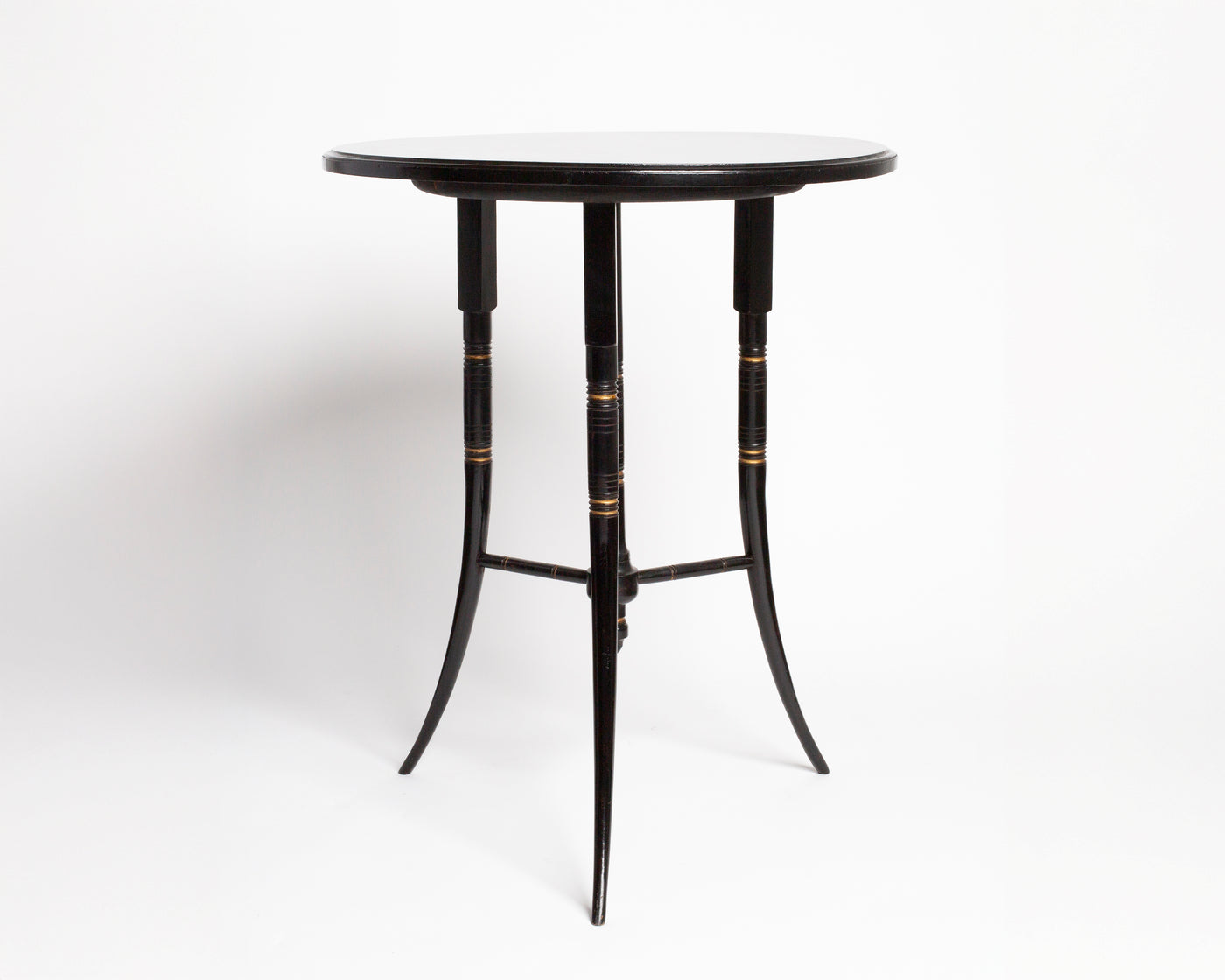 ANTIQUE ROUND SIDE TABLE IN BLACK BY E W GODWIN [1870]