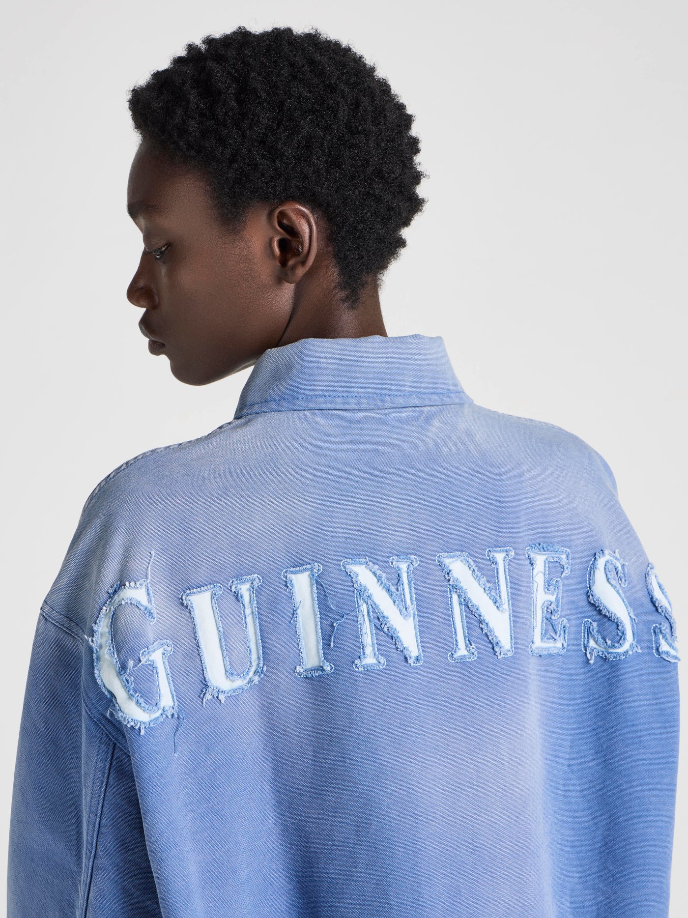 Unisex JW ANDERSON X GUINNESS WORKWEAR CHORE JACKET IN MID-BLUE WASHED DENIM