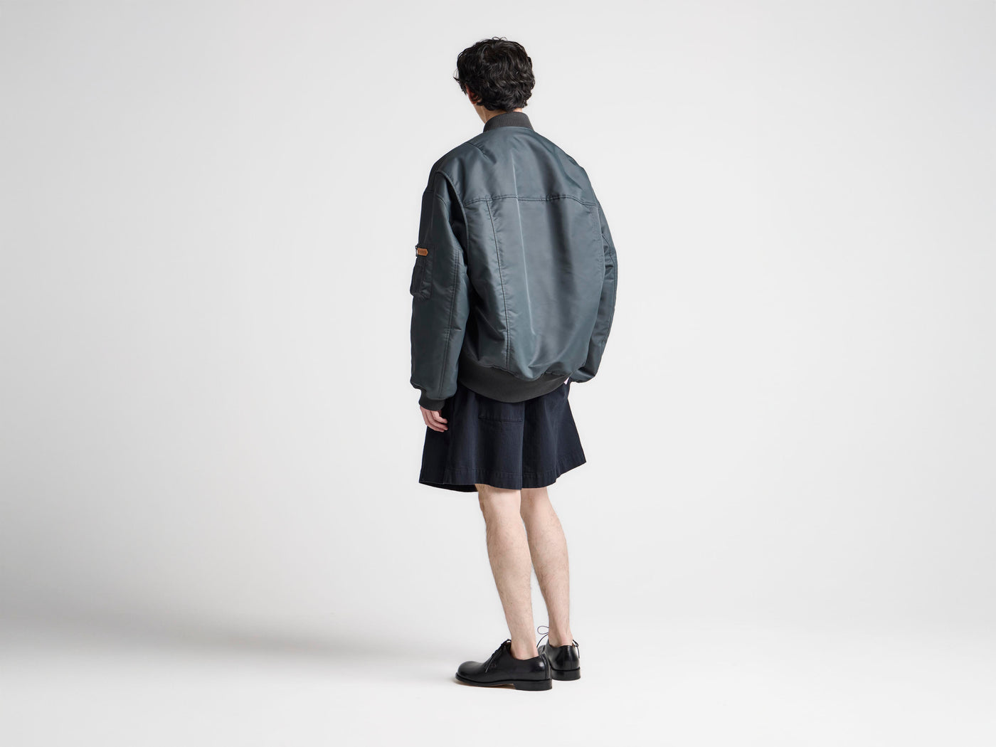 MENS OVERSIZED TIPPED HEM BOMBER JACKET IN DARK GREY