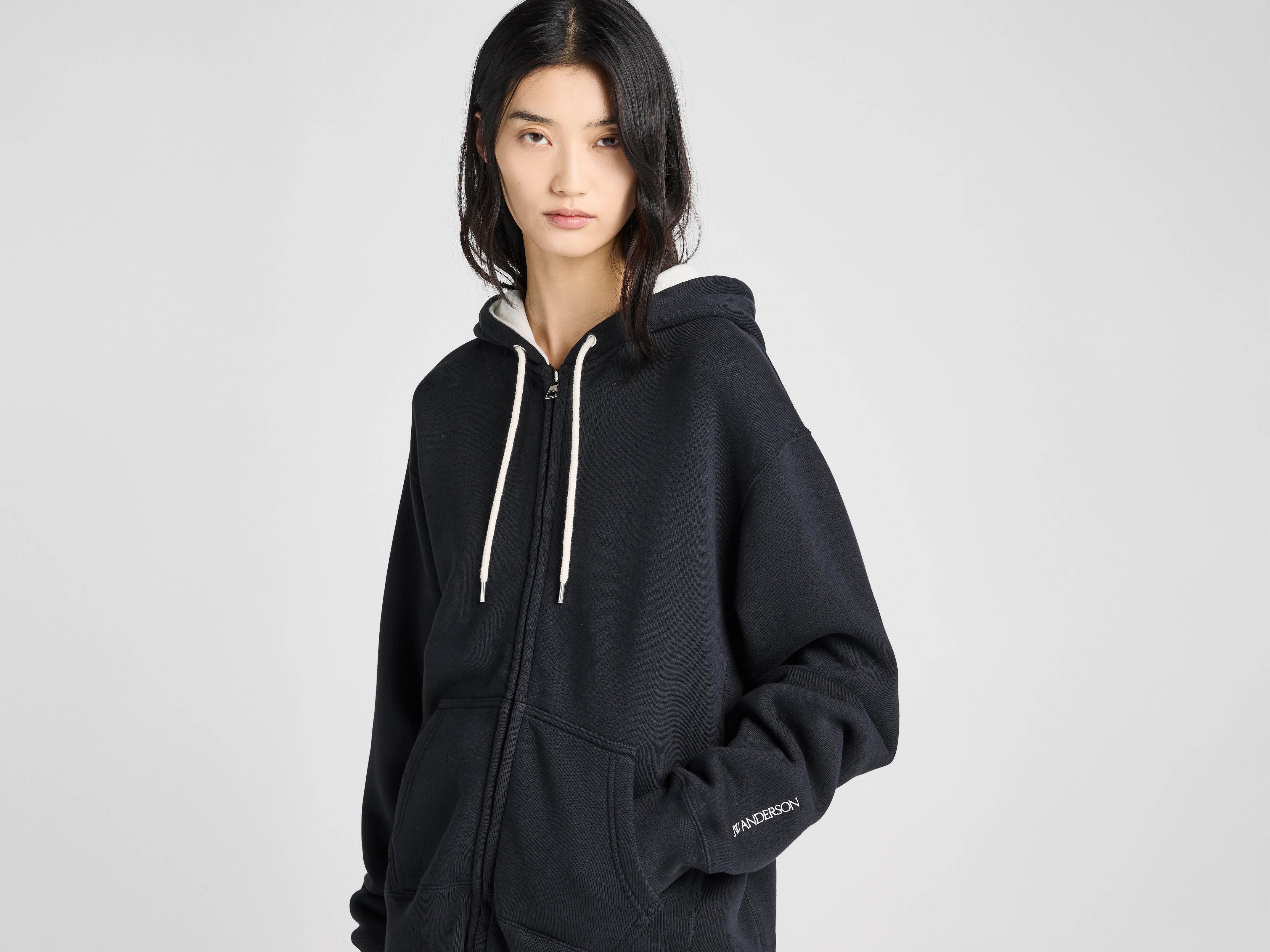 Unisex JW ANDERSON X GUINNESS HOODED SWEATSHIRT IN WASHED BLACK in