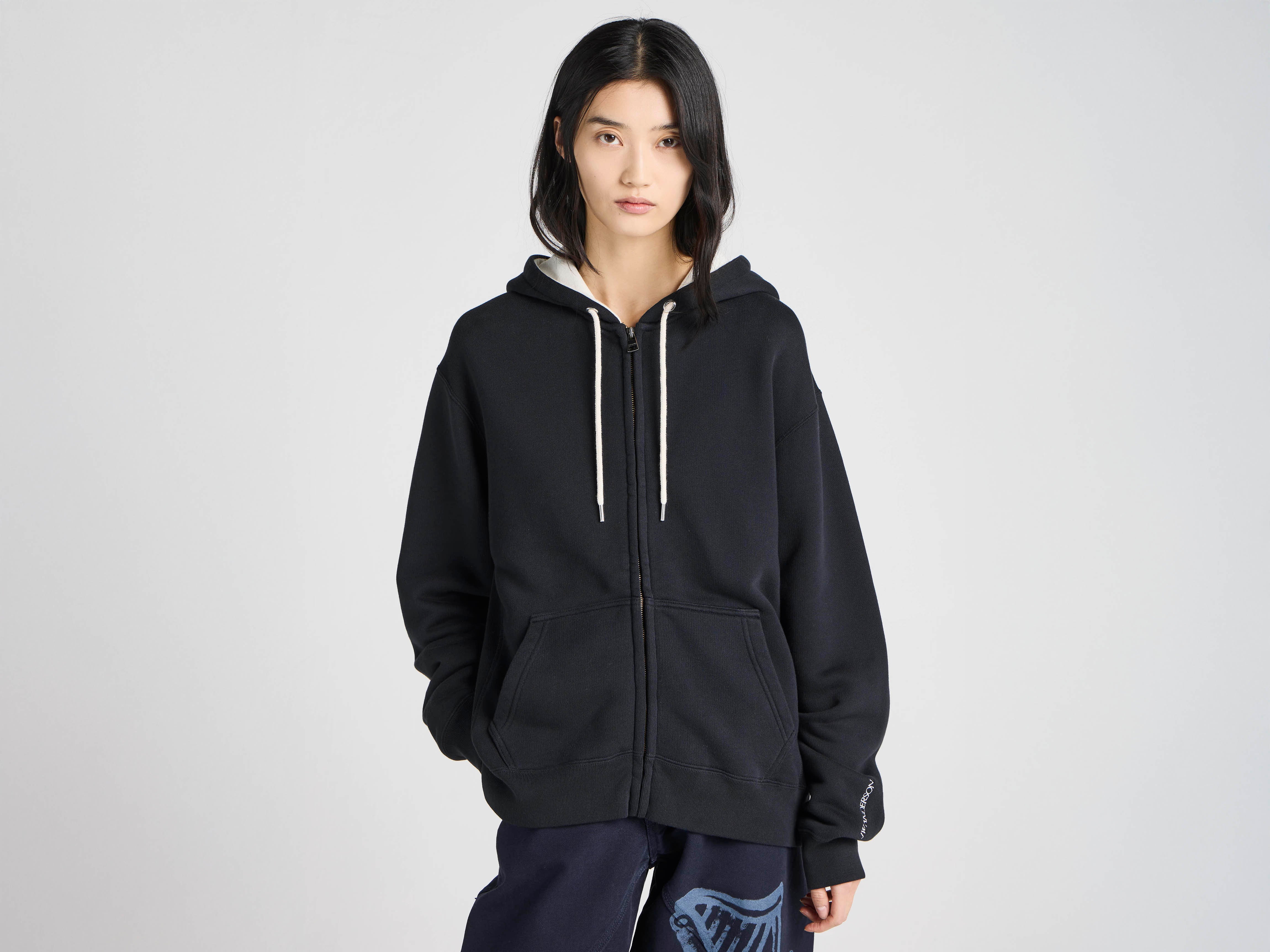 Unisex JW ANDERSON X GUINNESS HOODED SWEATSHIRT IN WASHED BLACK in