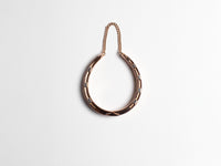 HORSESHOE BANGLE IN 15kt GOLD