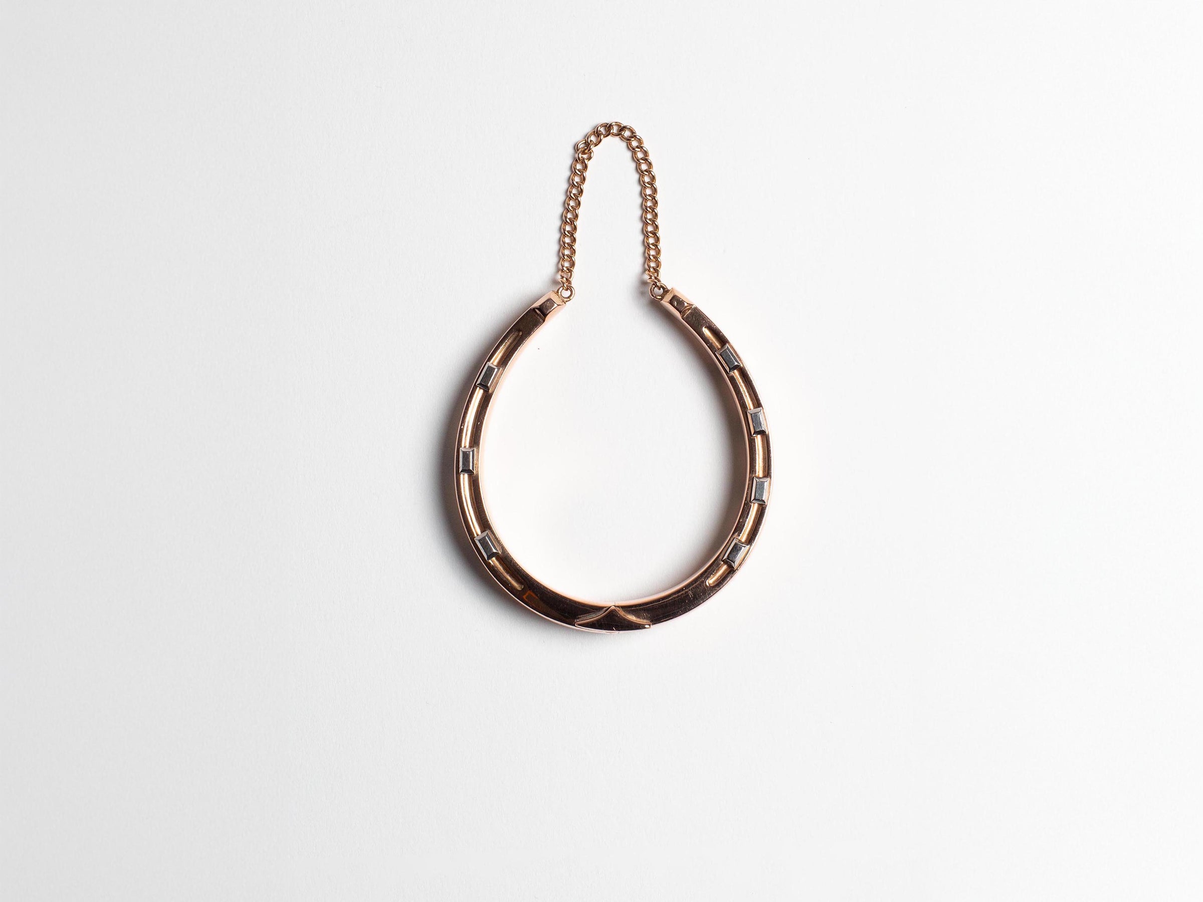HORSESHOE BANGLE IN 15kt GOLD