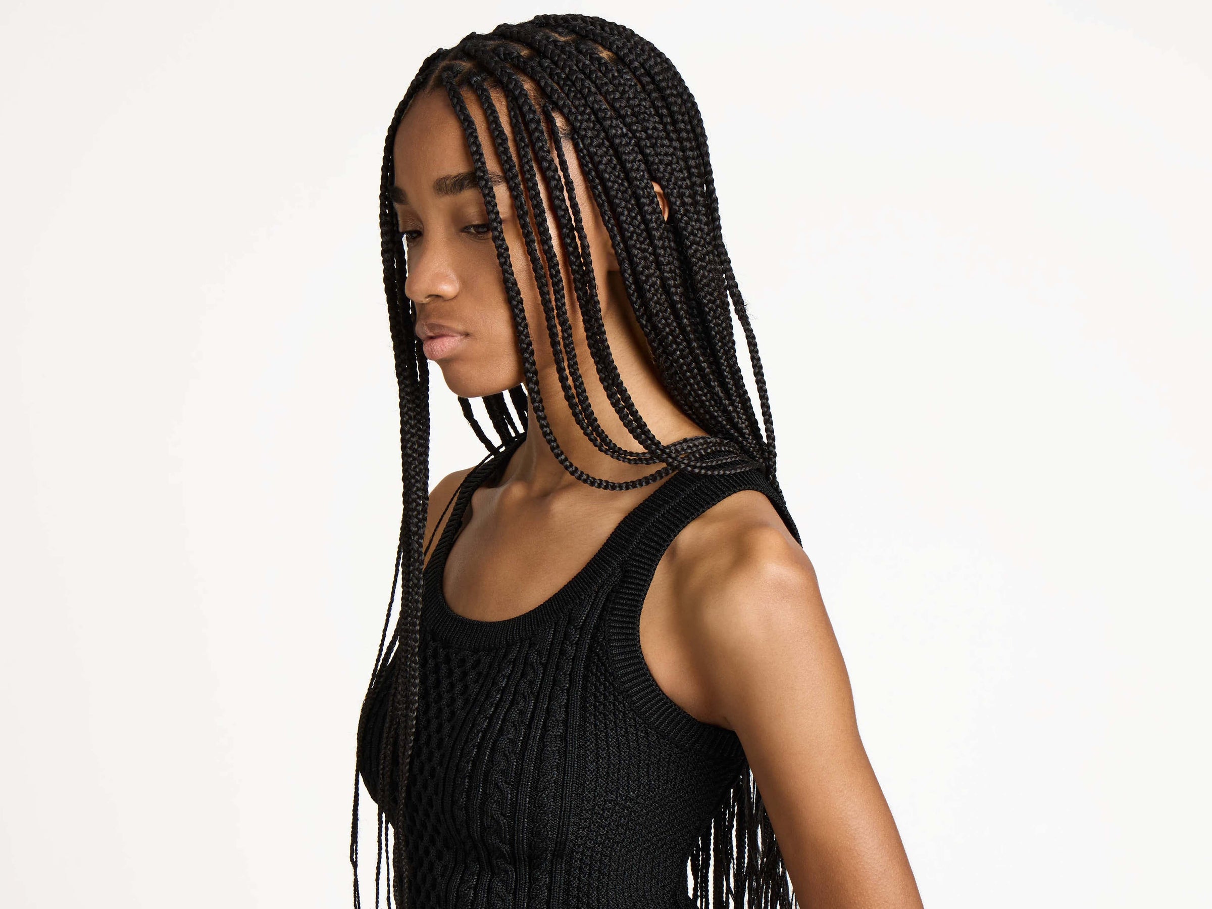 CABLE-KNIT TANK TOP IN BLACK