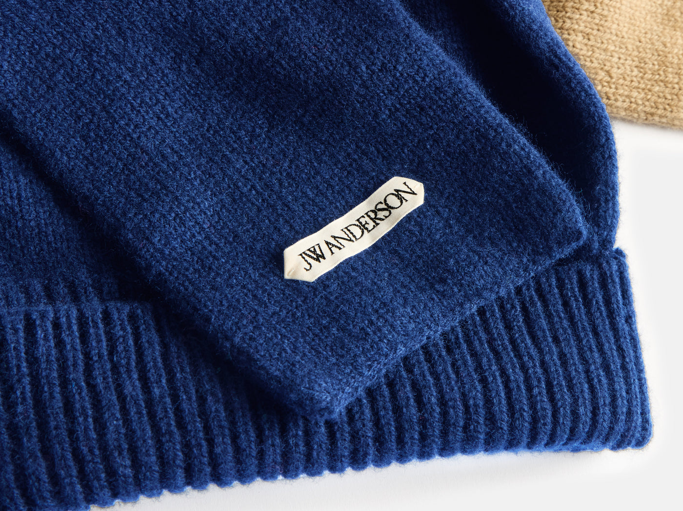 KNOTTED BEANIE HAT IN NAVY