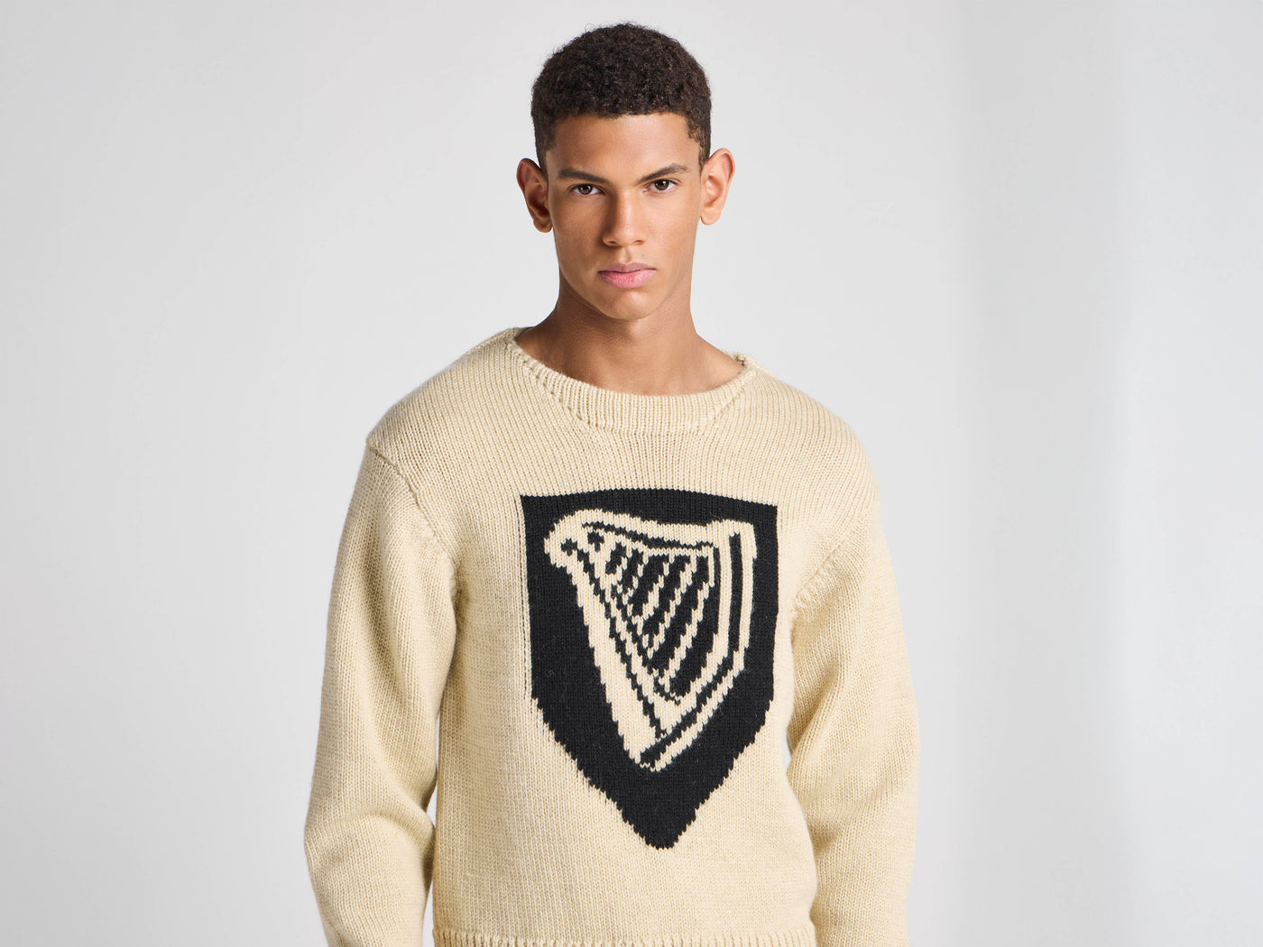 Unisex JW ANDERSON X GUINNESS SHIELD HARP JUMPER IN IVORY