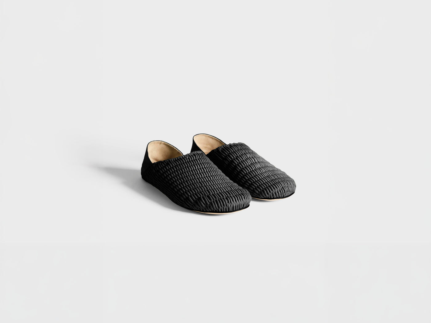 WOMENS SLIPPER MULES IN BLACK WOVEN LEATHER