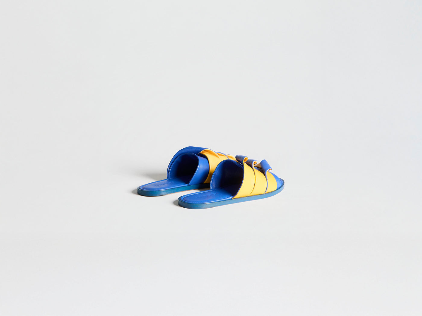 WOMENS CONTRASTING LEATHER COIL SLIDE IN BLUE & YELLOW