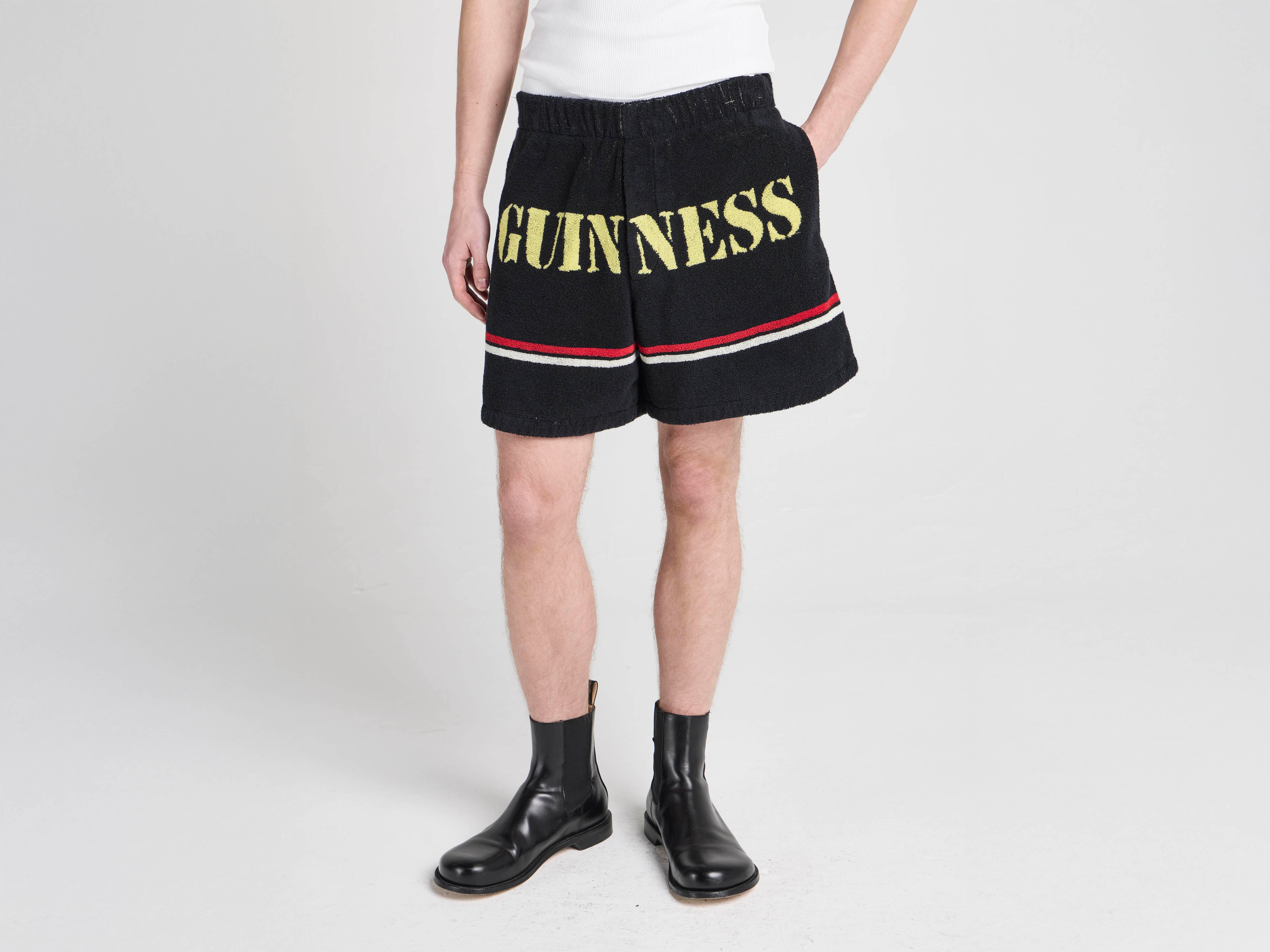 Unisex JW ANDERSON X GUINNESS TOWELLING SHORTS IN BLACK in BLACK