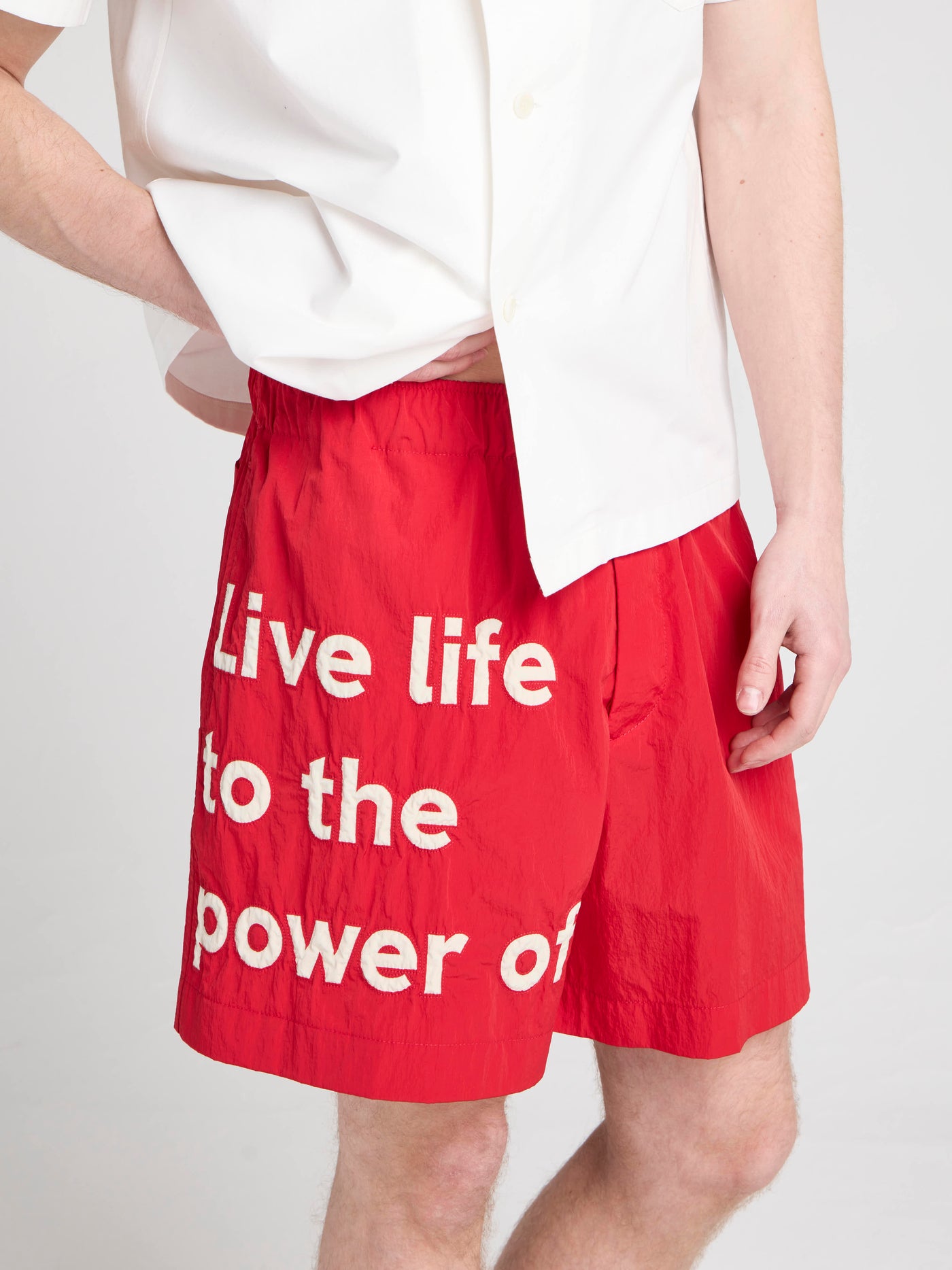 Unisex JW ANDERSON X GUINNESS SLOGAN TRACK SHORTS IN RED