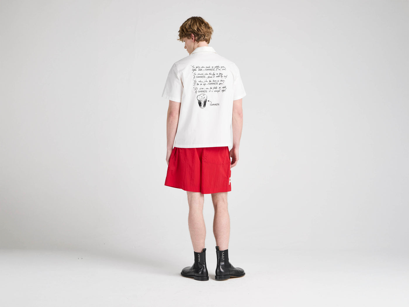 Unisex JW ANDERSON X GUINNESS SLOGAN TRACK SHORTS IN RED