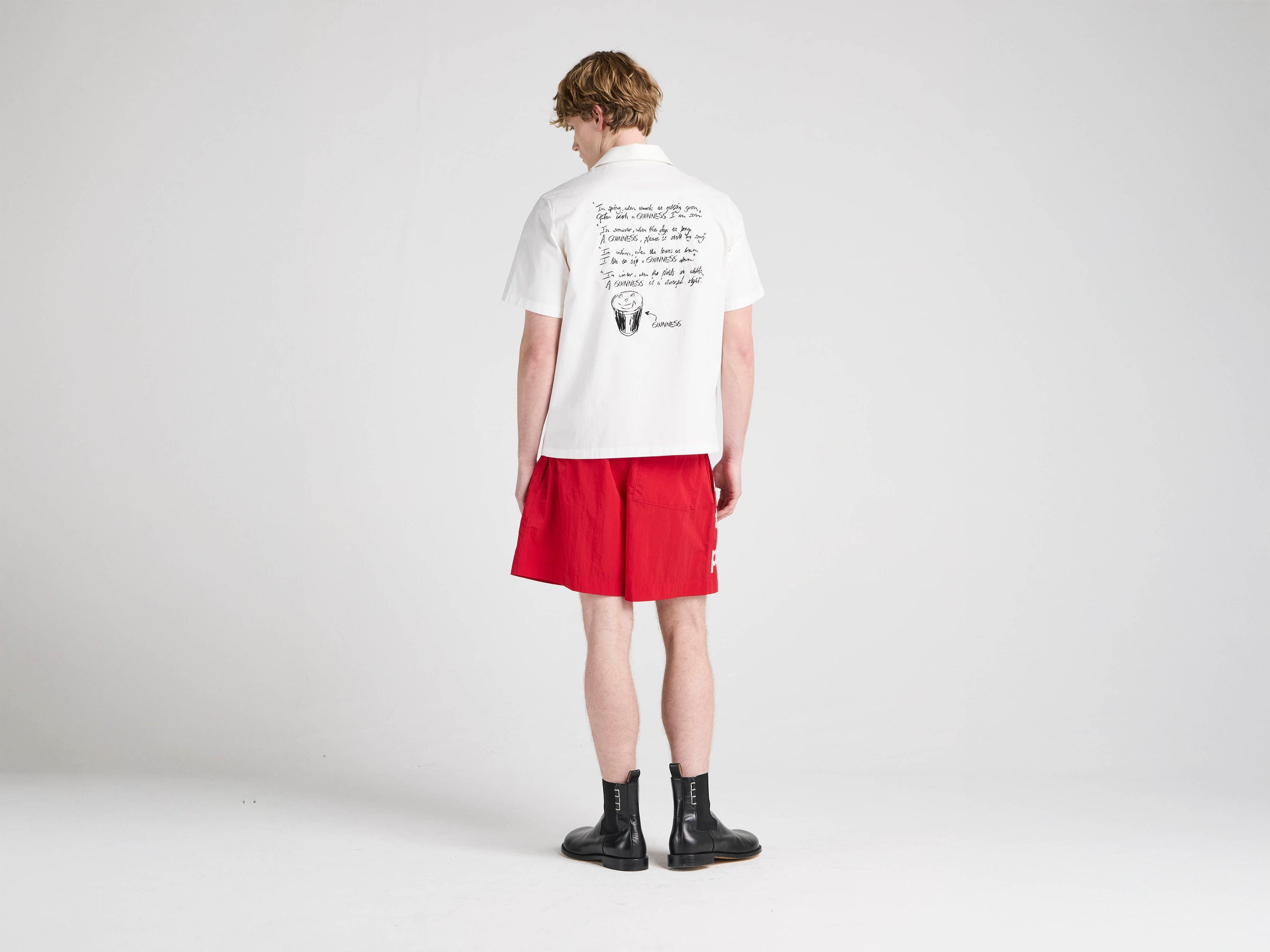 Unisex JW ANDERSON X GUINNESS SLOGAN TRACK SHORTS IN RED